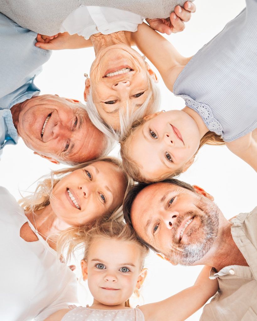 Were team family always. Shot of a family huddling together at home.